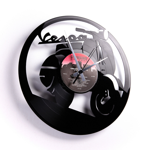 Laser cut vinyl record clocks by Disc O'Clock Upcyclist