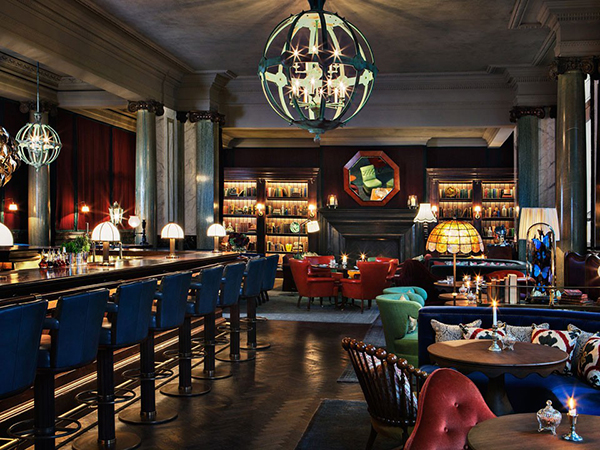 Bespoke upholstery bar interior by Sedilia London
