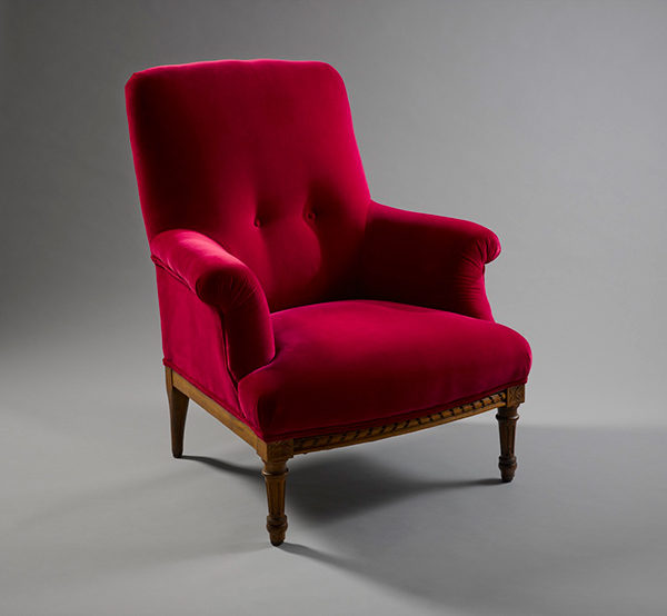 Red upholstered vintage fauteuil by Susan Osborne