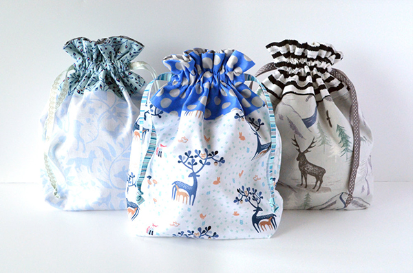 Drawstring gift bags made from deer print fabric by Sew and Tell Handmade