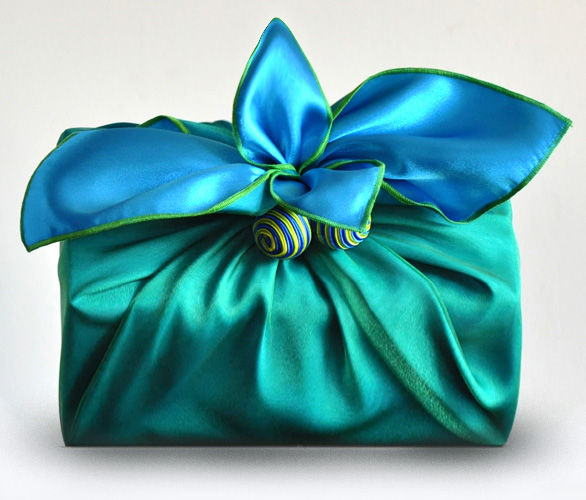Gift wrapped in green and blue satin wrapping scarf