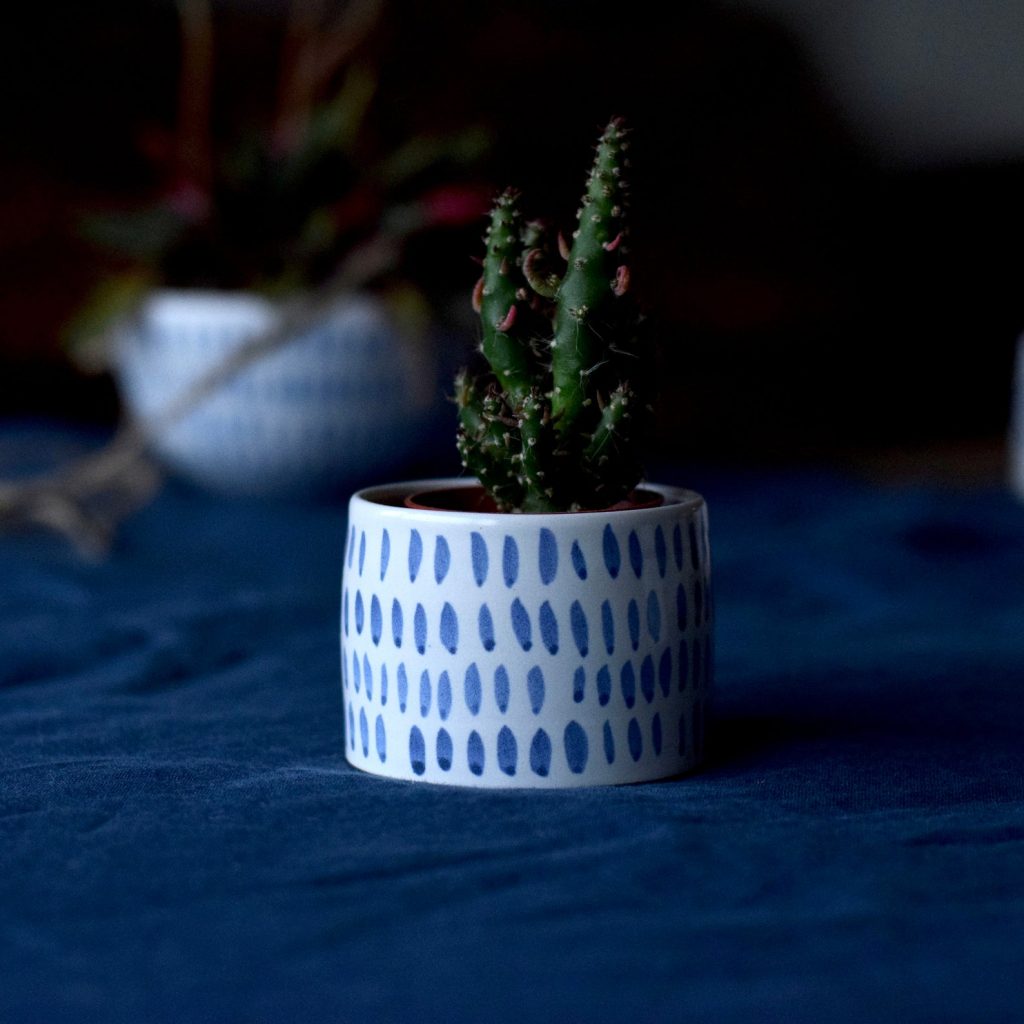 Blue painted ceramic plant pot