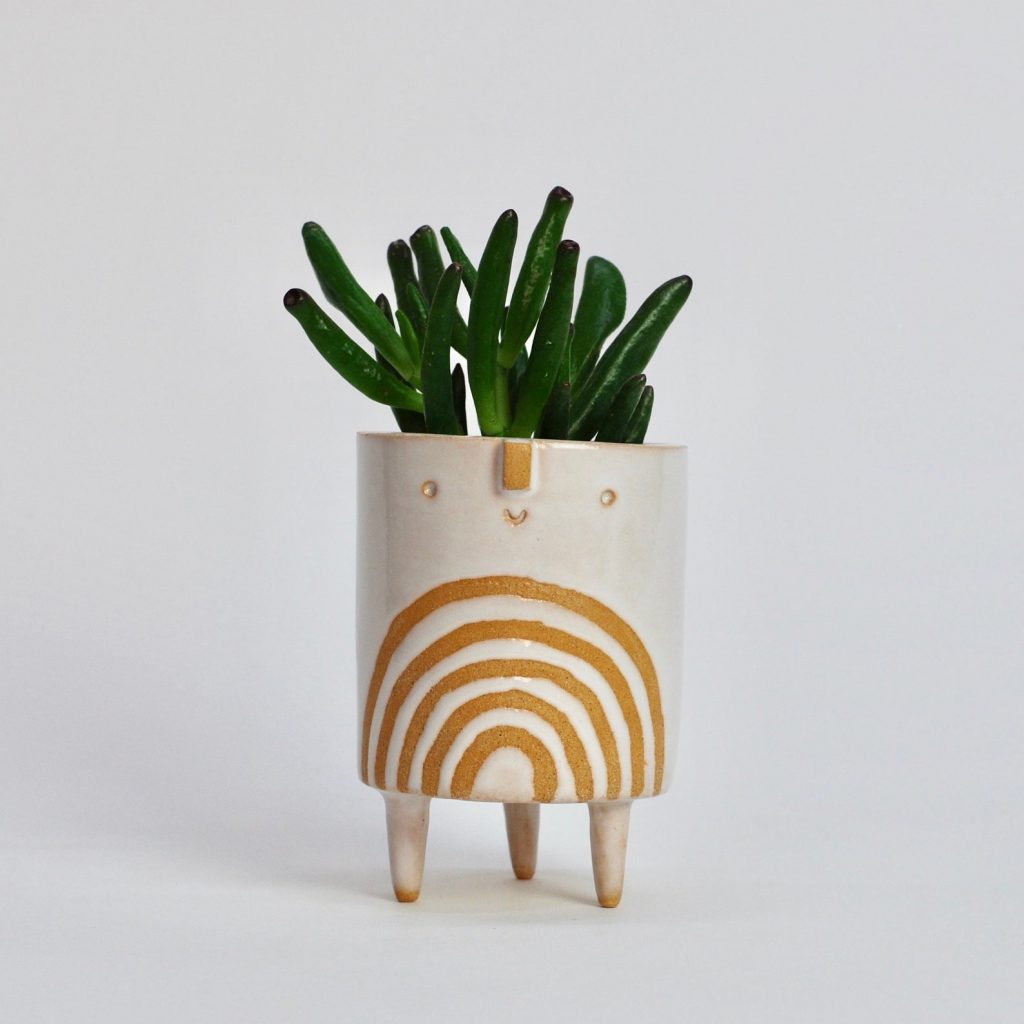 Small ceramic planter with face