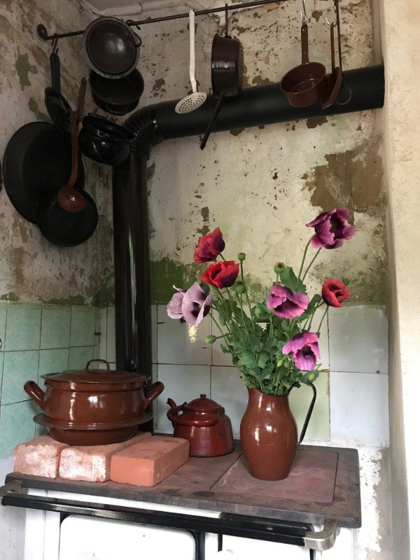 Traditional stove in a dilapidated cottage