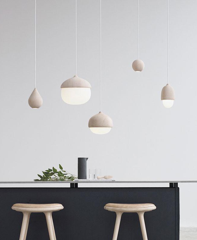 Wood pendant lighting over kitchen counters by Mater